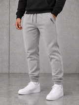 ESSENTIALS Jogger mit Taschenlogo und NS401 Black unbedruckt – Moon Grey Heather #farbe_moon grey heather